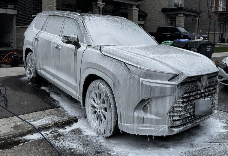 Toyota Grand Highlander covered in snow foam